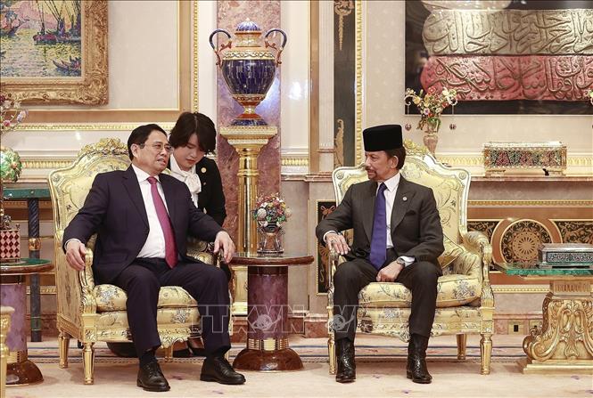 PM Pham Minh Chinh and Sultan of Brunei Haji Hassanal Bolkiah. VNA Photo: Dương Giang