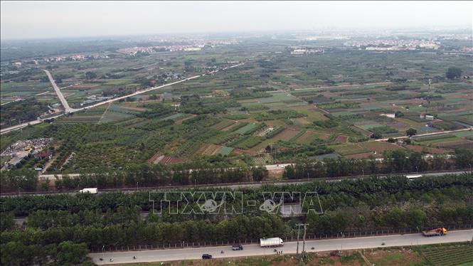 Tuyến vành đai 4 qua đại lộ Thăng Long trên địa bàn xã Song Phương. Ảnh: Huy Hùng - TTXVN