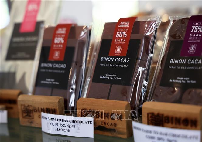 Trong ảnh: Các sản phẩm thương hiệu Binon Cacao bán trong các siêu thị Nhật Bản tại Việt Nam và xuất khẩu đi Nhật Bản.
Ảnh: Hồng Đạt - TTXVN
