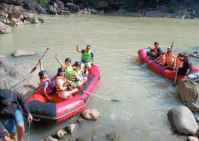 Tourists experience boat trips on Serepok river in the Central Highlands province of Dak Lak. VNA Photo