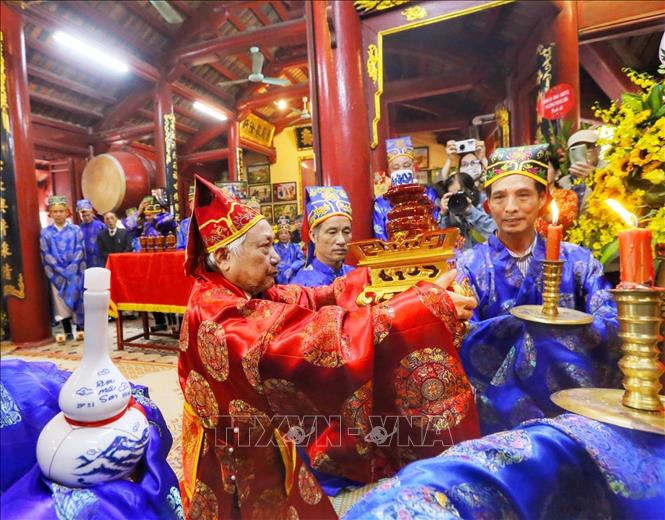 Nghi thức dâng rượu tại Lễ Tế Hội đồng. Ảnh: Tuấn Đức - TTXVN