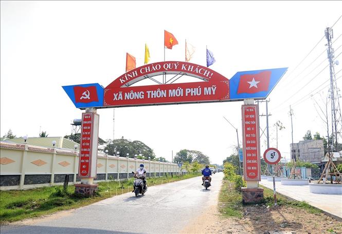 Trong ảnh: Xã Phú Mỹ đạt chuẩn nông thôn mới trên vùng biên giới huyện Giang Thành (Kiên Giang). Ảnh: Hồng Đạt - TTXVN
