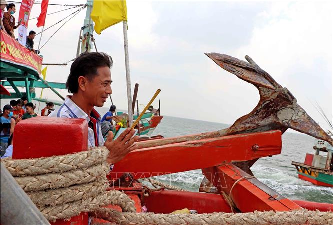 Ca Ong is a deity who helps them overcome all hazards at sea, and so fishermen pray to the whale for a safe trip every time they go fishing. VNA Photo: Huỳnh Anh