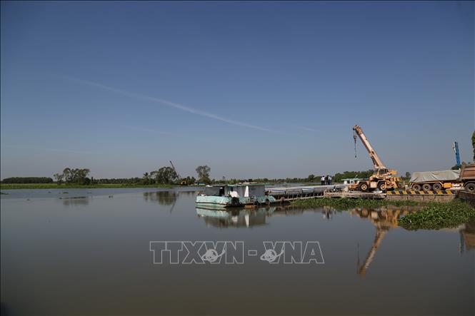 Mặt sông Vàm Cỏ Đông thông thoáng, tàu vận chuyển hàng hóa cập cảng Bến Kéo dễ dàng (thuộc địa phận xã Long Thành Nam, thị xã Hòa Thành, tỉnh Tây Ninh). Ảnh: Thanh Tân - TTXVN