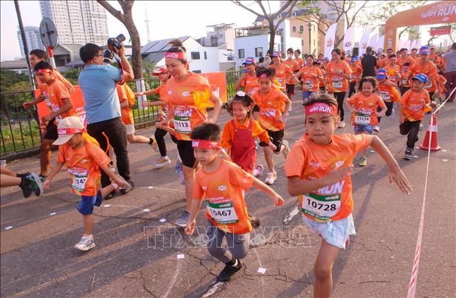 Đông đảo trẻ em đồng hành tham gia Giải chạy Happy Run. Ảnh: Trần Lê Lâm – TTXVN 