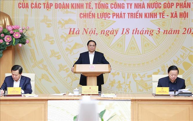 Minister Pham Minh Chinh chairs a conference on solutions to innovate the operation of the Committee for Management of State Capital at Enterprises. VNA Photo: Dương Giang
