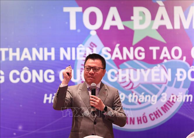 Tổng biên tập Báo Nhân dân, Phó Trưởng Ban Tuyên giáo Trung ương, Chủ tịch Hội nhà báo Việt Nam Lê Quốc Minh tham luận về chuyển đổi số. Ảnh: Hoàng Hiếu - TTXVN