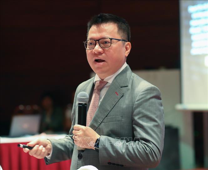 Tổng biên tập Báo Nhân Dân, Phó Trưởng Ban Tuyên giáo Trung ương, Chủ tịch Hội Nhà báo Việt Nam Lê Quốc Minh tham luận về công tác chuyển đổi số ở các toà soạn. Ảnh: Nguyễn Thu Phương - TTXVN phát