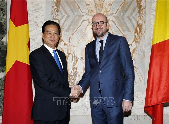 Thủ tướng Bỉ Charles Michel đón và hội đàm với Thủ tướng Nguyễn Tấn Dũng thăm chính thức Vương quốc Bỉ (Brussels, 2/12/2015). Ảnh: Đức Tám-TTXVN