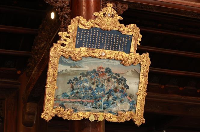 Tranh gương cổ lưu trữ tại Bảo tàng Cổ vật Cung đình Huế. Ảnh: Dương Giang-TTXVN

