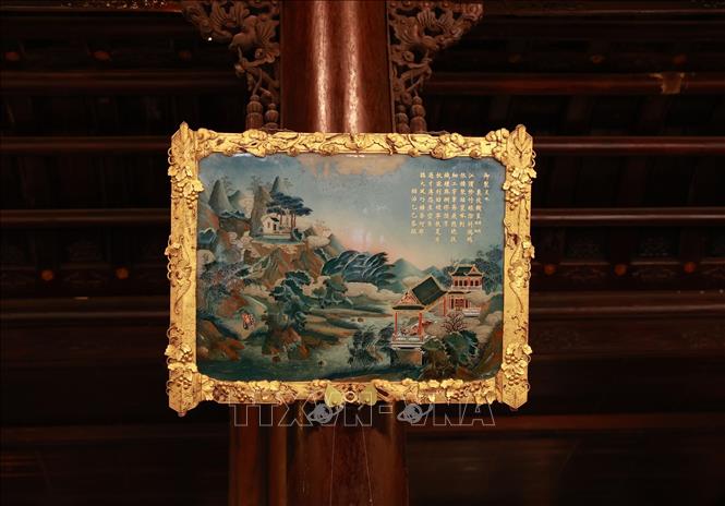 Tranh gương cổ lưu trữ tại Bảo tàng Cổ vật Cung đình Huế. Ảnh: Dương Giang-TTXVN
