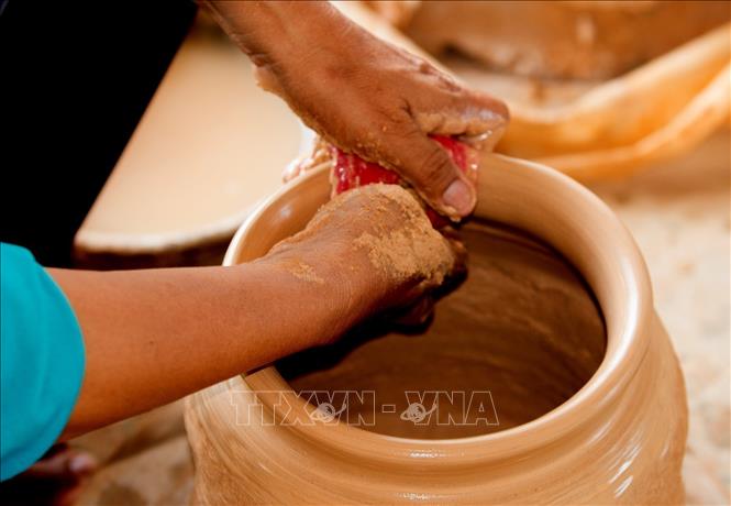 Go pottery products are renowned for being made entirely by hand. VNA Photo: Hồng Đạt
