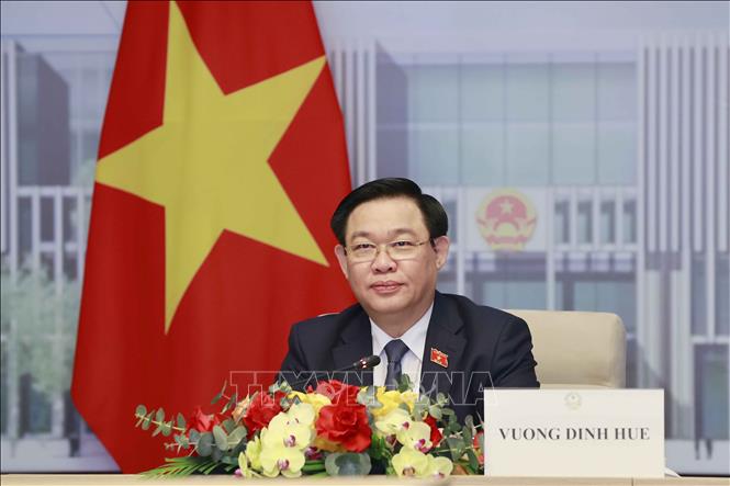 NA Chairman Vuong Dinh Hue attends the virtual talks. VNA Photo: Doãn Tấn