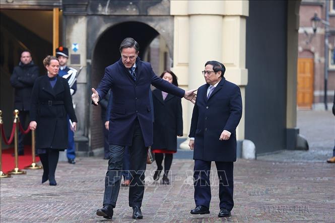 Thủ tướng Mark Rutte chủ trì lễ đón Thủ tướng Phạm Minh Chính thăm chính thức Vương quốc Hà Lan (Den Haag, 12/12/2022). Ảnh: Dương Giang-TTXVN