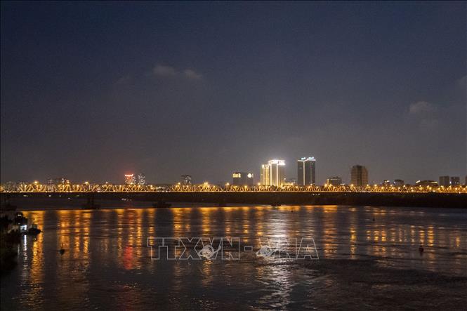 Chuong Duong Bridge across the Red River in Hanoi at night. Photo by courtesy/VNA