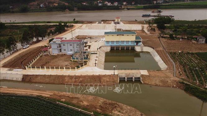 Trạm bơm tưới tiêu Khám Lạng thuộc xã Khám Lạng, huyện Lục Nam được đầu tư 79 tỷ đồng, phục vụ nước tưới và tiêu úng cho 37.000ha đất nông nghiệp của xã Khám Lạng (trạm bơm đã hoàn thành đưa vào sử dụng tháng 4/2023). Ảnh: Vũ Sinh - TTXVN