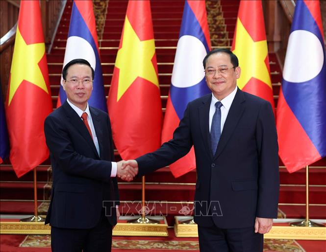 President meets with Lao PM and NA Chairman separately - VNA Photos ...