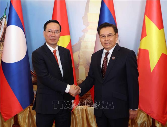 President meets with Lao PM and NA Chairman separately - VNA Photos ...