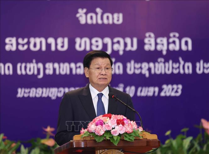 Party General Secretary and President of Laos Thongloun Sisoulith speaks at the event. VNA Photo: Thống Nhất