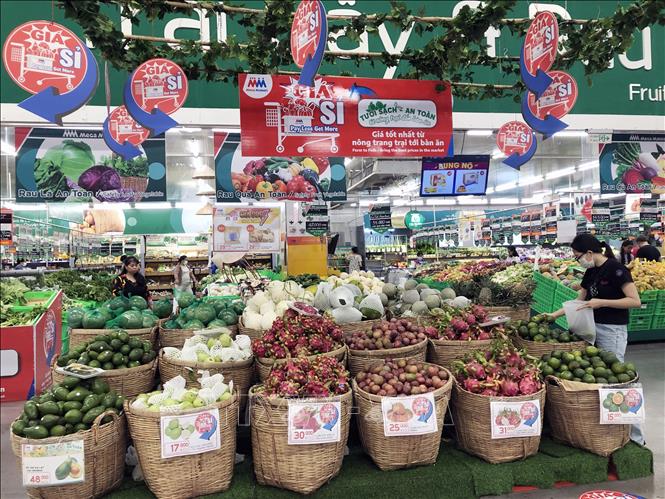 Một siêu thị thiết kế khu vực riêng để tiếp thị đa dạng nông sản, thực phẩm Việt đến người tiêu dùng. Ảnh: Mỹ Phương - TTXVN
