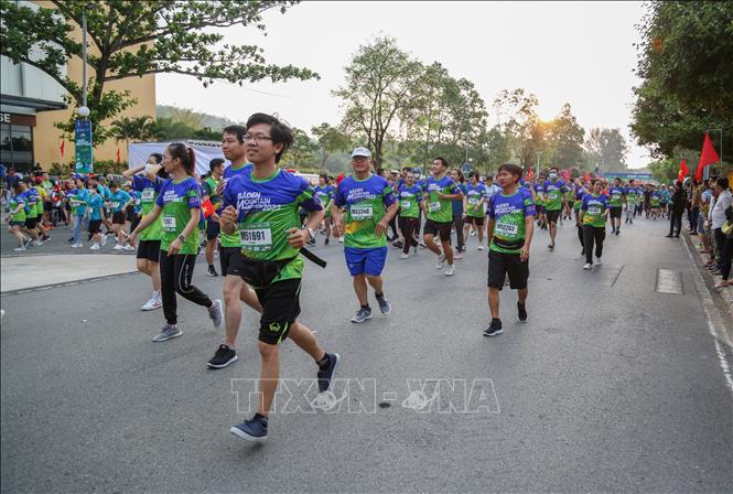 Runners during the race. VNA Photo: Thanh Tân