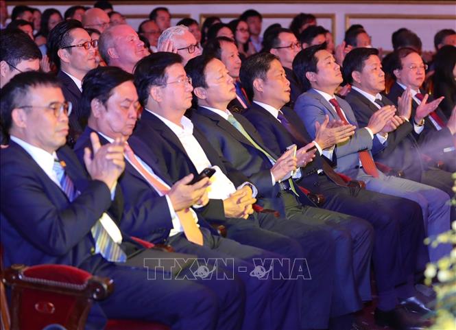 Ủy viên Bộ Chính trị, Trưởng Ban Kinh tế Trung ương Trần Tuấn Anh, Phó Thủ tướng Trần Hồng Hà và lãnh đạo các bộ, ban, ngành tham dự buổi lễ. Ảnh: Hoàng Hiếu - TTXVN