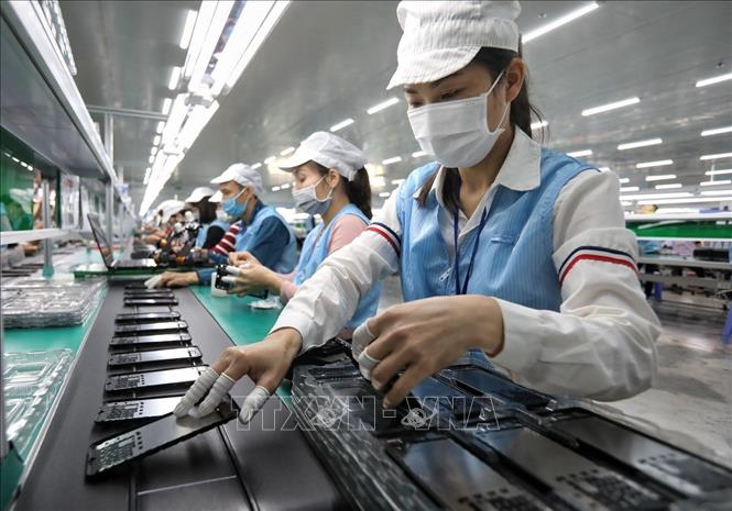Dây chuyền sản xuất tại Công ty CP Sun Tech tại cụm công nghiệp Thanh Vân (Hiệp Hoà, Bắc Giang). Ảnh: Danh Lam - TTXVN