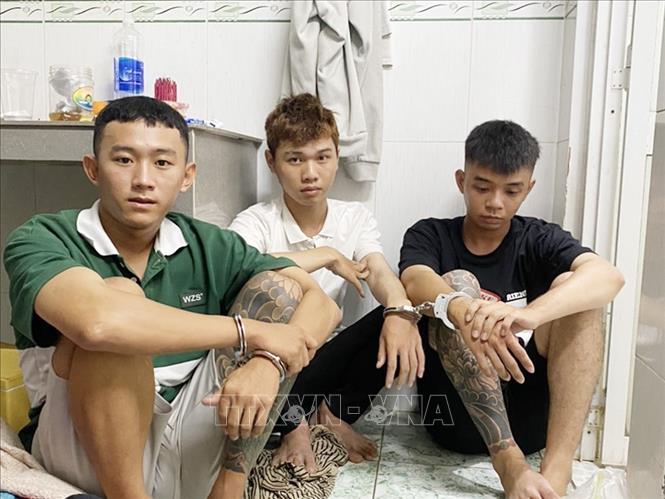 Các đối tượng Nghĩa, Đăng, Thành (thứ tự từ trái qua). Ảnh: TTXVN phát