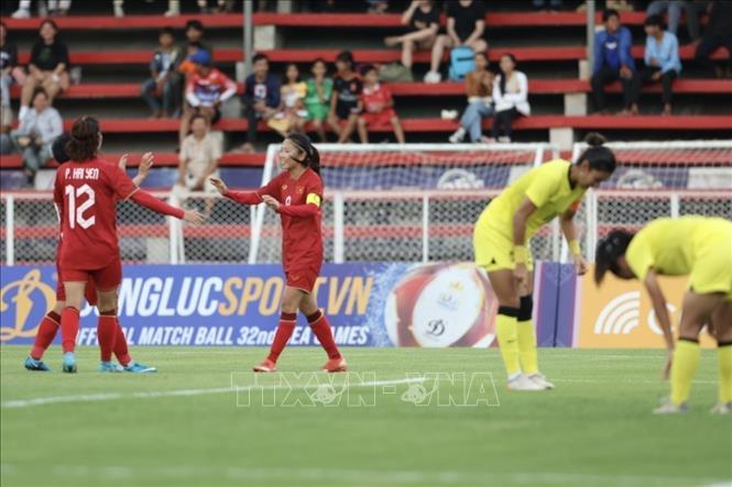 Huynh Nhu (9) scores the third goal for Vietnam at the 34th minute of the match. VNA Photo: Minh Quyết