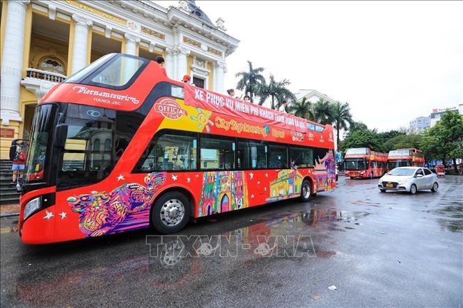 Double-decker bus provides a tour of the capital city. VNA Photo: Tuấn Anh