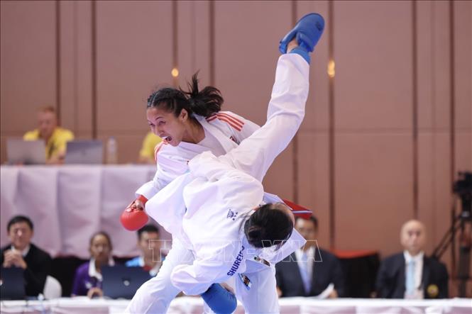 VĐV Hoàng Thị Mỹ Tâm thi đấu xuất sắc, giành chiến thắng với tỷ số 4-3 trước đối thủ Agung (Indonesia). Ảnh: Minh Quyết - TTXVN