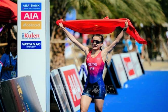 Niềm vui của VĐV Nguyễn Thị Phương Trinh khi về đích. Ảnh: AKP/TTXVN phát