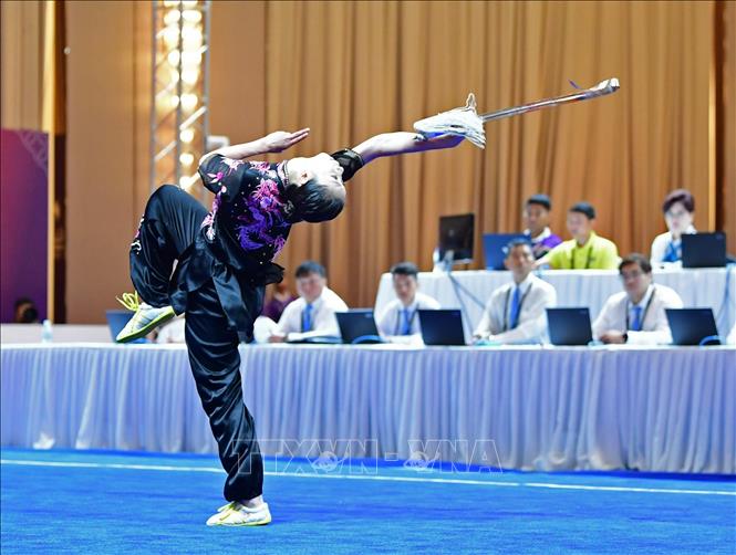 Dương Thúy Vi biểu diễn nội dung kiếm thuật nữ, sáng 11/5 với thành tích 9,623 điểm. Ảnh: Hoàng Linh-TTXVN