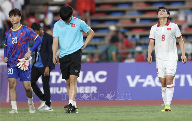 Nỗi buồn của các cầu thủ đội U22 Việt Nam. Ảnh: Hoàng Linh-TTXVN