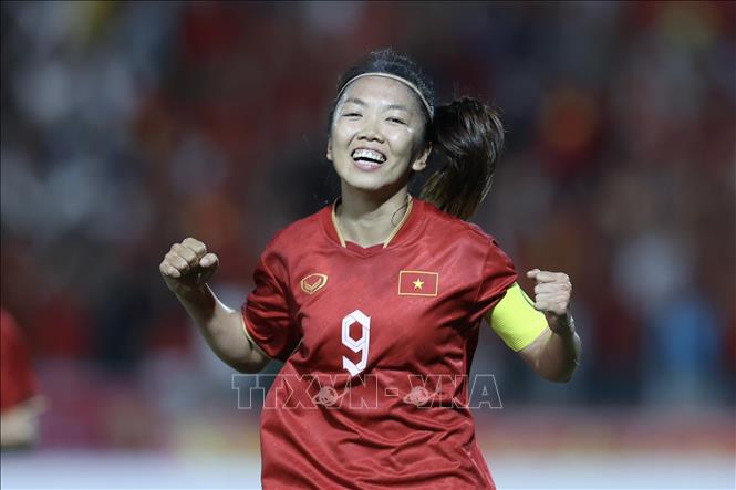 Niềm vui của tiền đạo đội trưởng Huỳnh Như (9) khi ghi bàn mở tỷ số ở phút 12. Ảnh: Hoàng Linh-TTXVN