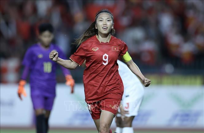 Captain of the Vietnamese women’s football team Huynh Nhu (9) scores the first goal at the 12th minute of the match. VNA Photo