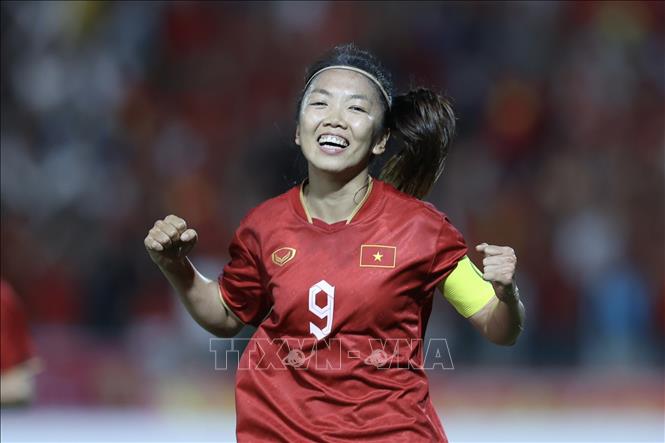 Captain of the Vietnamese women’s football team Huynh Nhu (9) scores the first goal at the 12th minute of the match. VNA Photo
