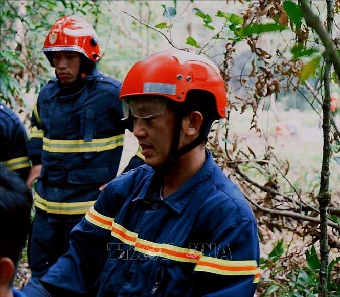 Trong ảnh: Trung tá Nguyễn Chí Thành trong một lần làm nhiệm vụ cứu nạn. Ảnh: TTXVN phát