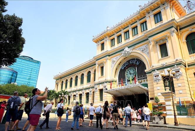 The Ho Chi Minh City Central Post Office fascinates tourists with its typical colonial French features, ranging from exterior to interior decorations. VNA Photo: Hồng Đạt