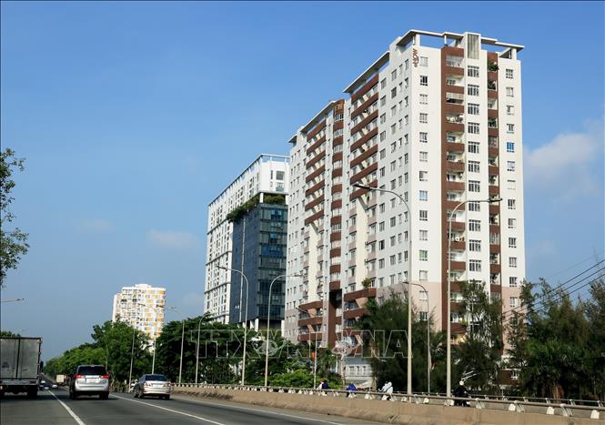Trong ảnh: Khu chung cư trên đường Nguyễn Văn Linh, quận 7, Thành phố Hồ Chí Minh. Ảnh: Hồng Đạt - TTXVN
