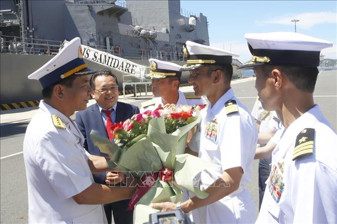 The Japan Maritime Self-Defence Force's largest destroyer, Izumo, and accompanying destroyer JS Samidare dock at Cam Ranh International Port in the south central province of Khanh Hoa on June 20, starting their visit to Vietnam from June 20-23. Photo by courtersy