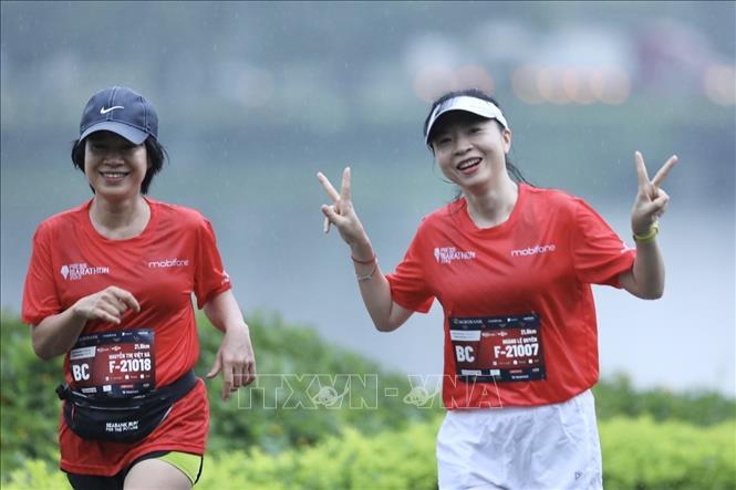 Các VĐV là các phóng viên, nhà báo và các đối tác truyền thông tham gia tranh tài. Ảnh: Minh Quyết - TTXVN