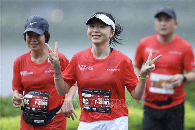 Các VĐV là các phóng viên, nhà báo và các đối tác truyền thông tham gia tranh tài. Ảnh: Minh Quyết - TTXVN