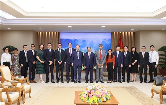 Prime Minister Pham Minh Chinh and the IMF delegation. VNA Photo: Dương Giang