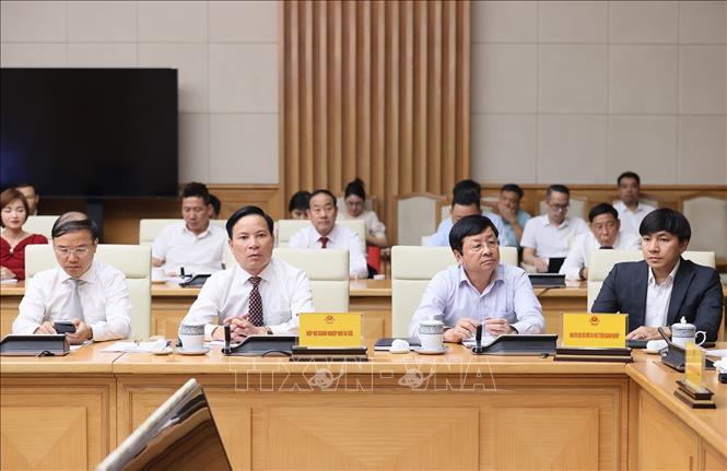Các đại biểu Hiệp hội Doanh nghiệp nhỏ và vừa tham dự buổi làm việc. Ảnh: Dương Giang-TTXVN