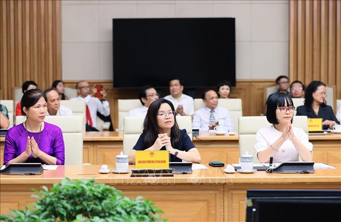 Các đại biểu Hiệp hội Doanh nghiệp nhỏ và vừa tham dự buổi làm việc. Ảnh: Dương Giang-TTXVN