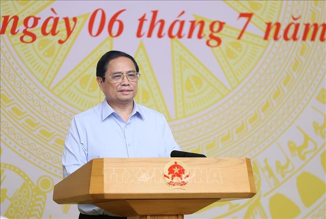 Thủ tướng Phạm Minh Chính phát biểu tại buổi làm việc với Hiệp hội Doanh nghiệp nhỏ và vừa. Ảnh: Dương Giang-TTXVN
