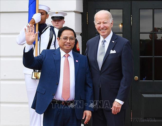 Tổng thống Joe Biden đón Thủ tướng Phạm Minh Chính dự chiêu đãi của Tổng thống Hoa Kỳ với các nhà lãnh đạo dự Hội nghị Cấp cao đặc biệt Hoa Kỳ - ASEAN (Washington D.C, 12/5/2022). Ảnh: Dương Giang-TTXVN