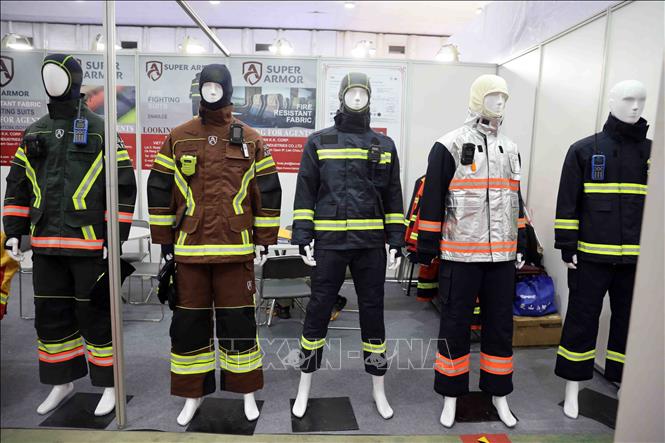 Fire safety and rescue clothing on display. VNA Photo: Phạm Kiên 