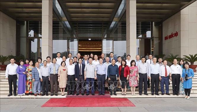 National Assembly Chairman Vuong Dinh Hue meets with the Vietnam Urban Development Planning Association in Hanoi on July 19. VNA Photo: Doãn Tấn